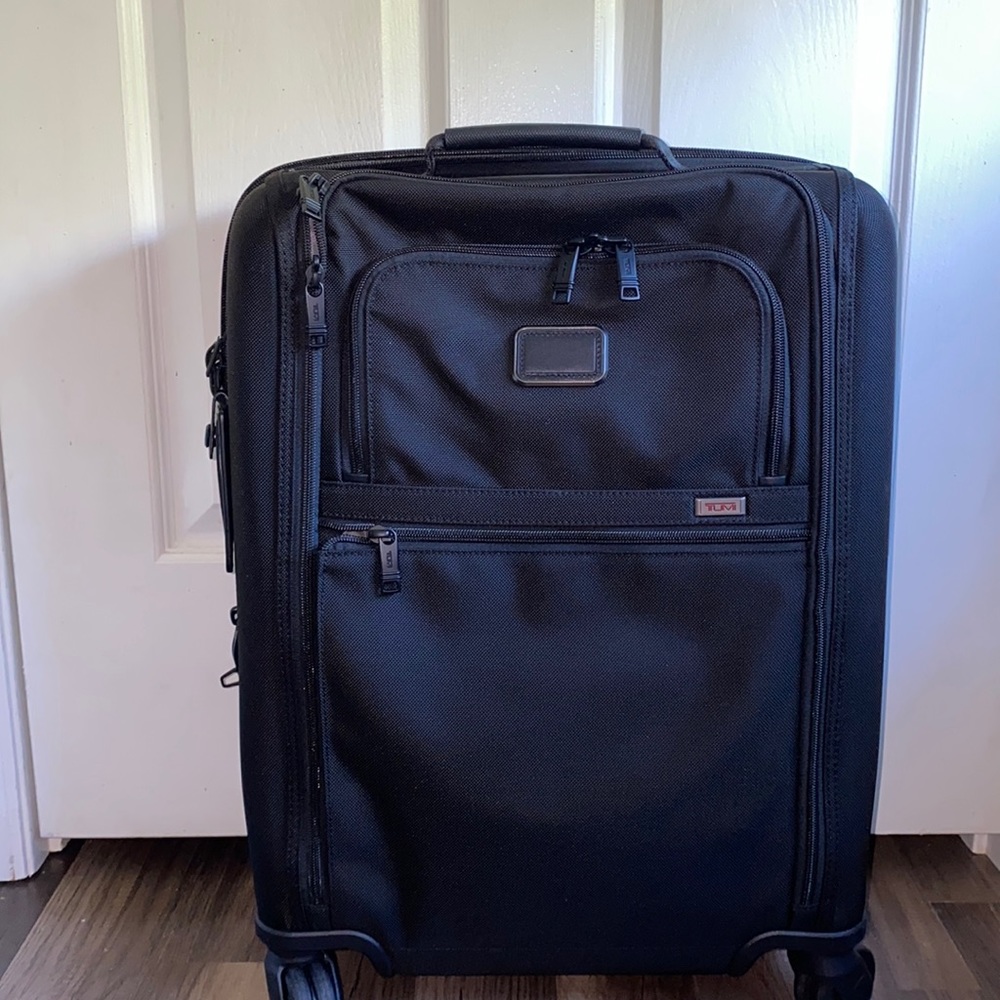 Tumi International 4 Wheeled Carry-On